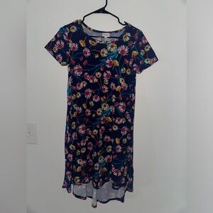 Lulouroe dress size XXS I’m size 5 and fits perfect.